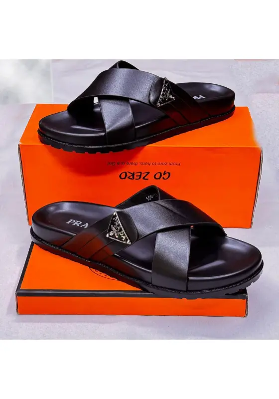 Prada black leather crisscross slides